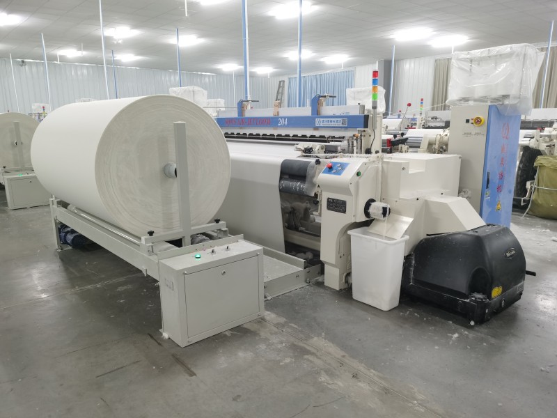 High speed air jet loom for clothing fabric